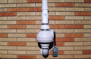 Close-up of a radon mitigation fan efficiently expelling radon gas from a home's foundation"